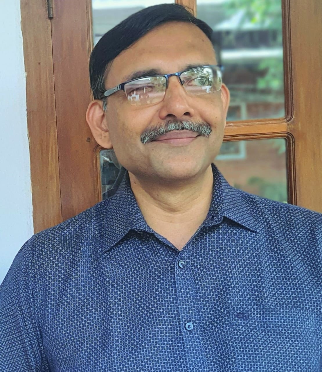 DR. RIJU SAIMON
